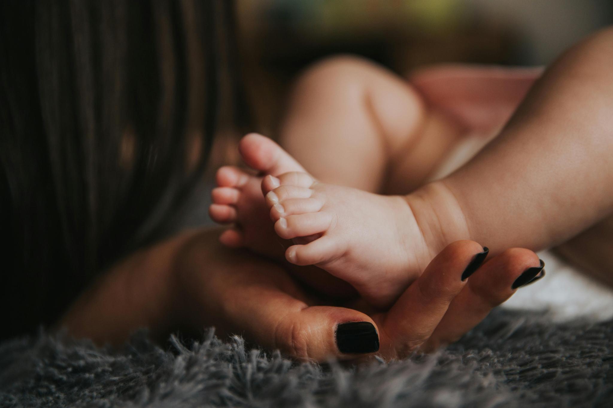 Newborn baby feet